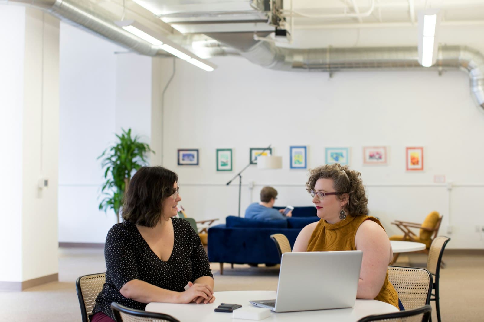 Colleagues working together in a bright office